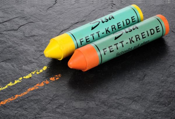 Grease crayons in yellow and orange