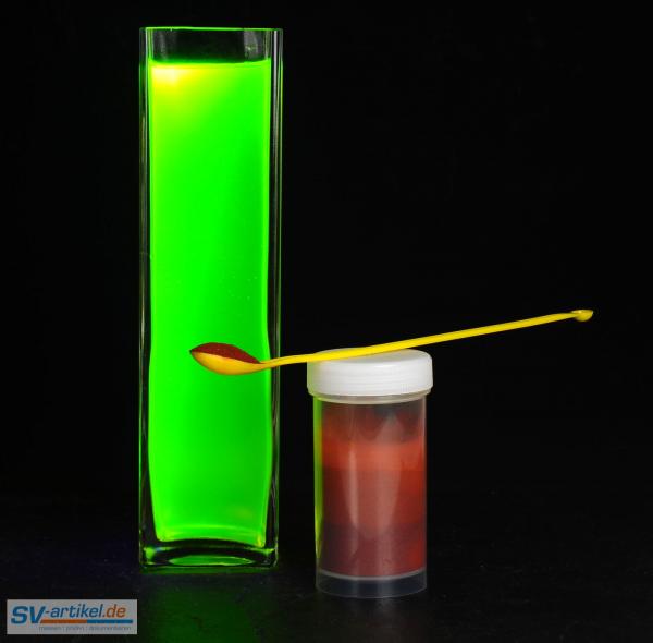 Uranine as powder and dissolved in water under UV light